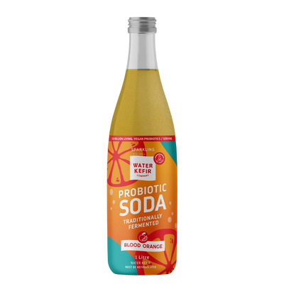 Bottle of probiotic soda with colorful label on a white background