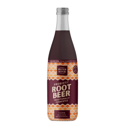 Bottle of probiotic root beer with a patterned label on a white background