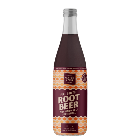 Bottle of probiotic root beer with a patterned label on a white background