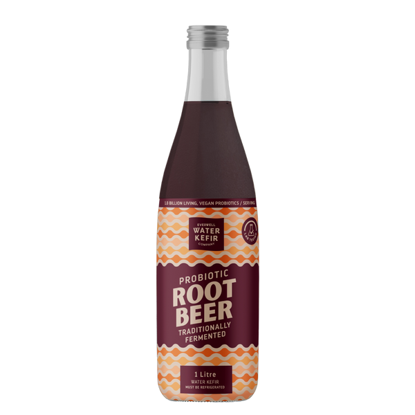 Bottle of probiotic root beer with a patterned label on a white background