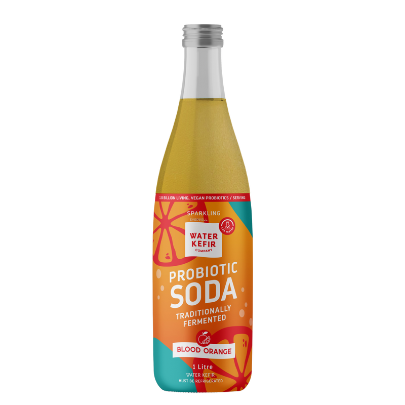 Bottle of probiotic soda with colorful label on a white background