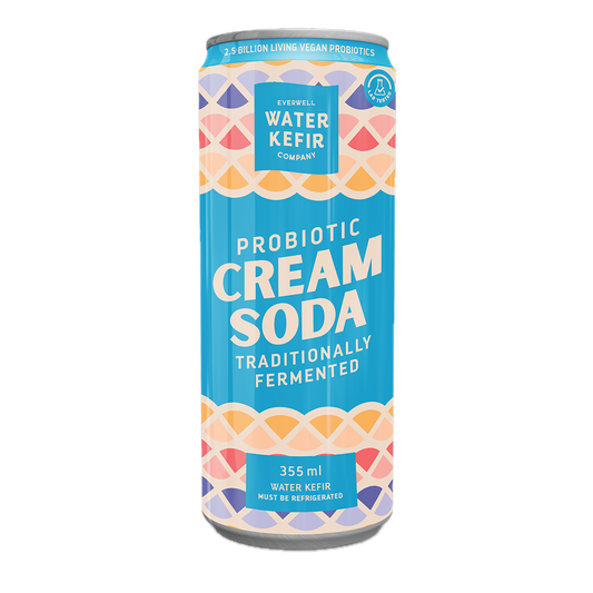 Probiotic cream soda can with colorful pattern and text on a white background