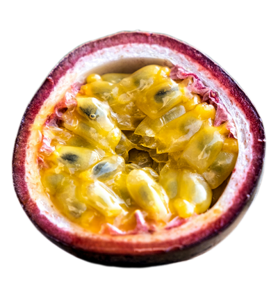 Halved passion fruit with yellow flesh and purple skin on a white background