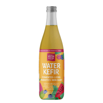 Bottle of Water Kefir with a colorful label on a white background