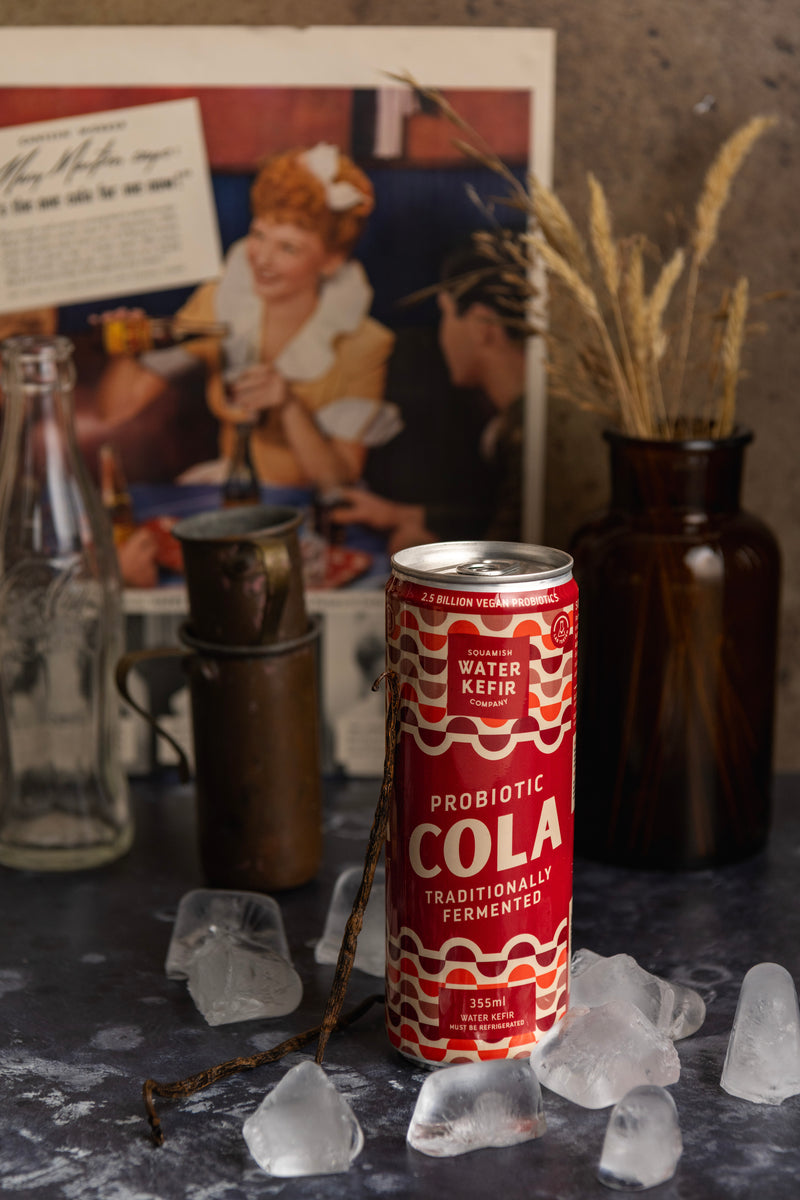 Can of Probiotic Cola with vintage-style background