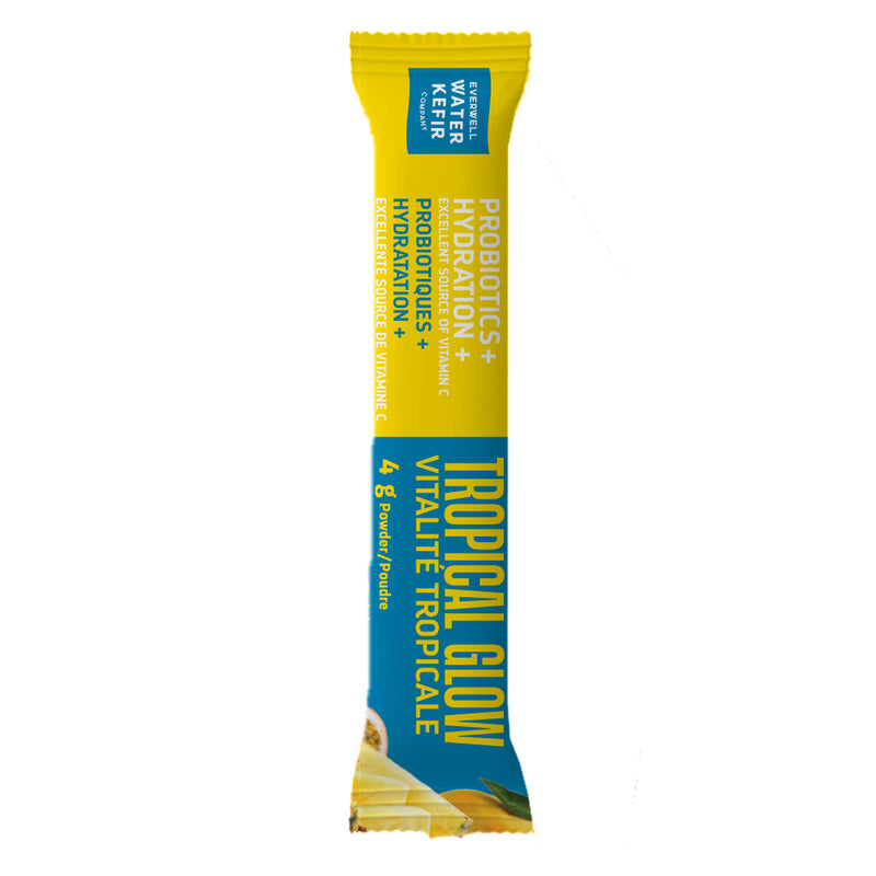 Water Kefir Tropical Glow drink mix sachet in yellow and blue packaging on a white background