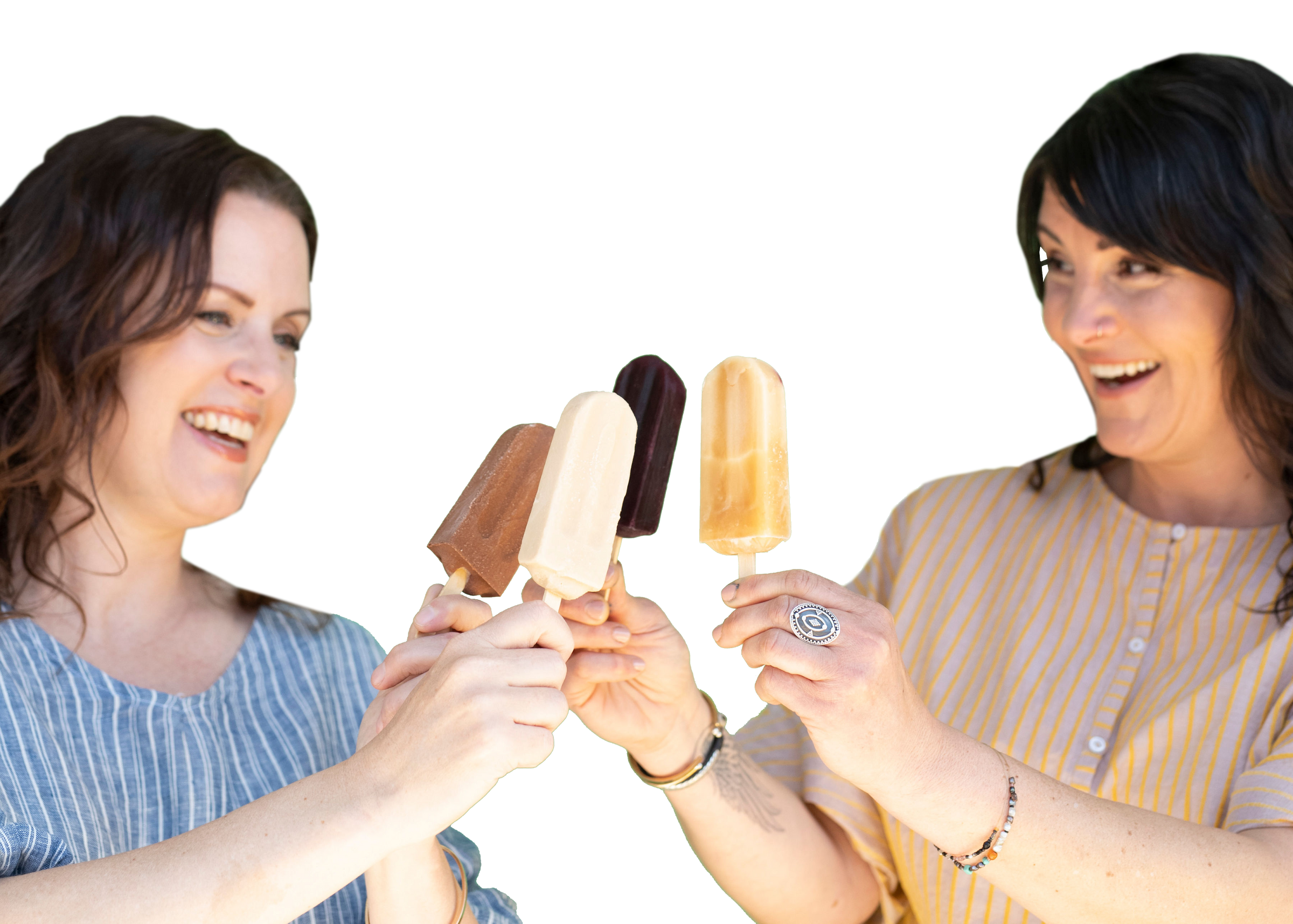 Two women smiling and holding ice cream bars against a white background